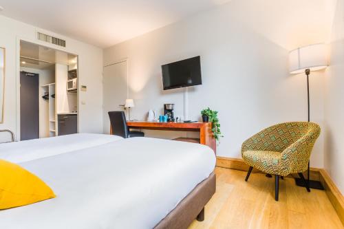 Estudio con 2 camas individuales del hotel Victoria Garden Bordeaux Centre. Foto 3