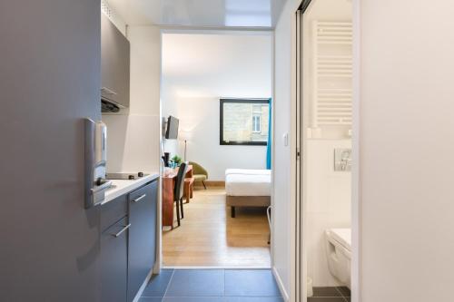 Estudio con 2 camas individuales del hotel Victoria Garden Bordeaux Centre. Foto 6