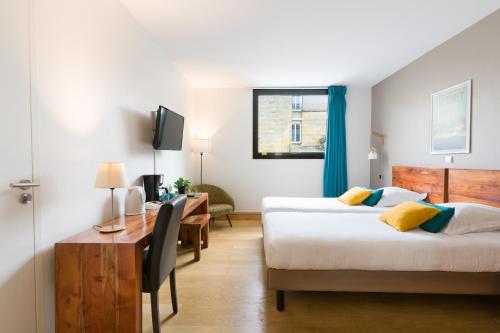 Estudio con 2 camas individuales del hotel Victoria Garden Bordeaux Centre. Foto 8