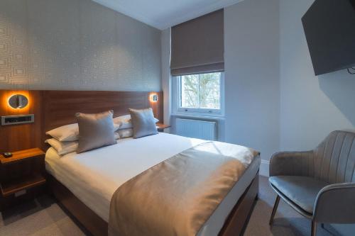 Habitación Doble Estándar del hotel London House. Foto 6