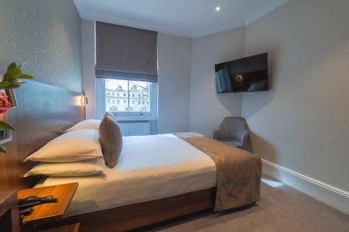 Habitación Doble Estándar del hotel London House. Foto 7