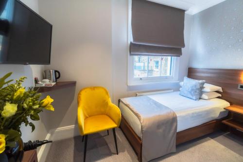 Habitación Individual del hotel London House. Foto 1