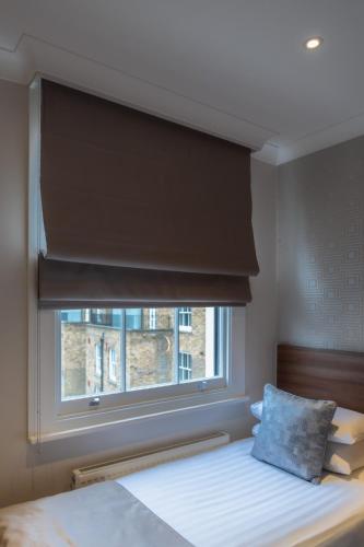 Habitación Individual del hotel London House. Foto 4