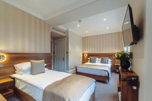 Habitación Triple del hotel London House