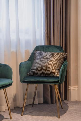Habitación cuádruple del hotel London House. Foto 6