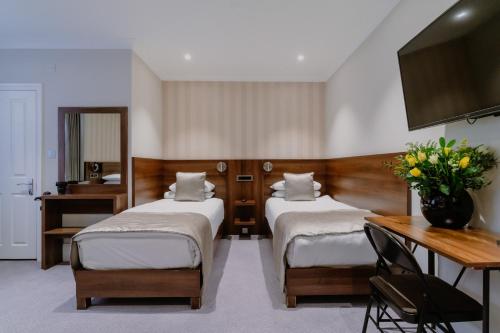 Habitación Familiar del hotel London House. Foto 6