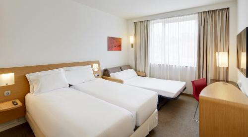 Habitación Doble Estándar con sofá del hotel Sercotel Valladolid