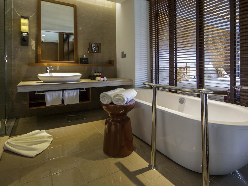 Habitación Deluxe, 1 cama de matrimonio grande del hotel Pullman Luang Prabang. Foto 5