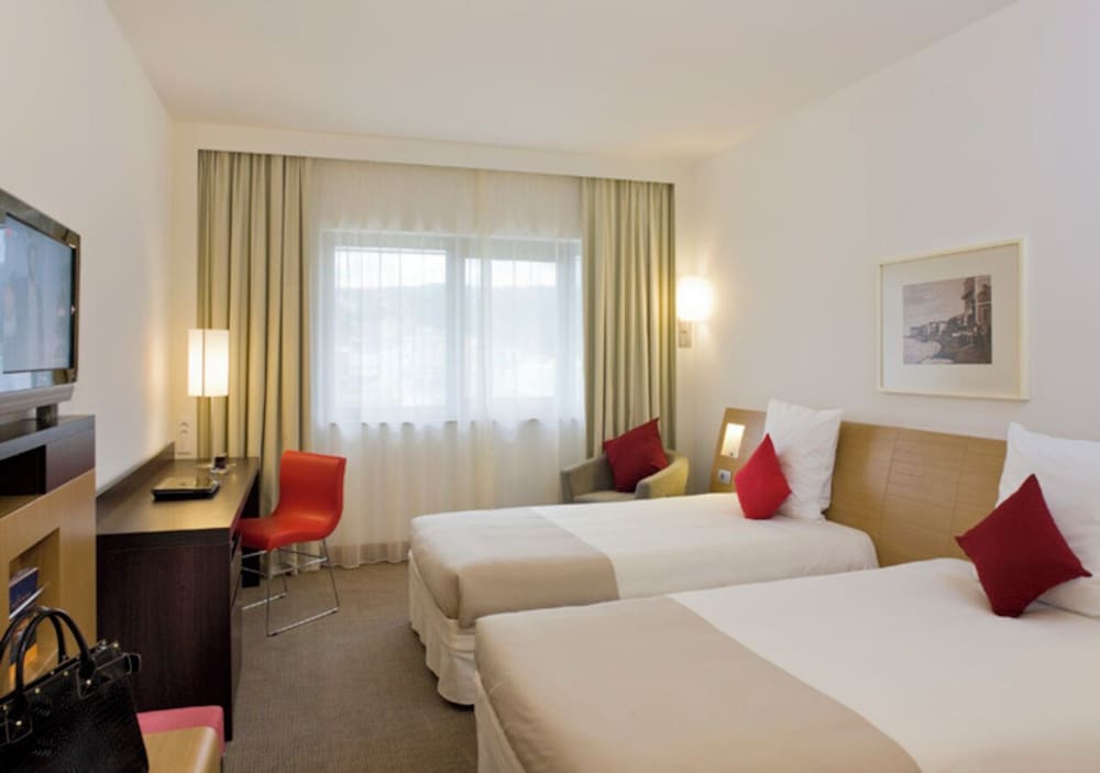 Habitación clásica, 2 camas individuales del hotel Novotel Paris Roissy CDG Convention. Foto 1