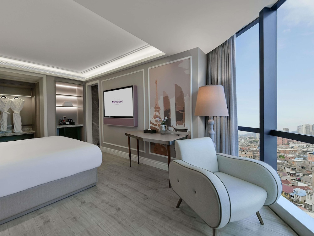 Habitación superior, 1 cama de matrimonio grande del hotel Mercure Xiamen On The Bund. Foto 2