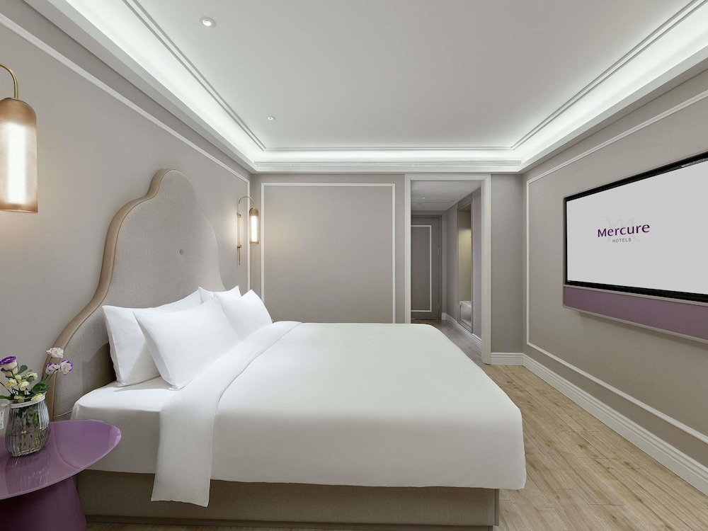 Habitación superior, 1 cama de matrimonio grande del hotel Mercure Xiamen On The Bund. Foto 3