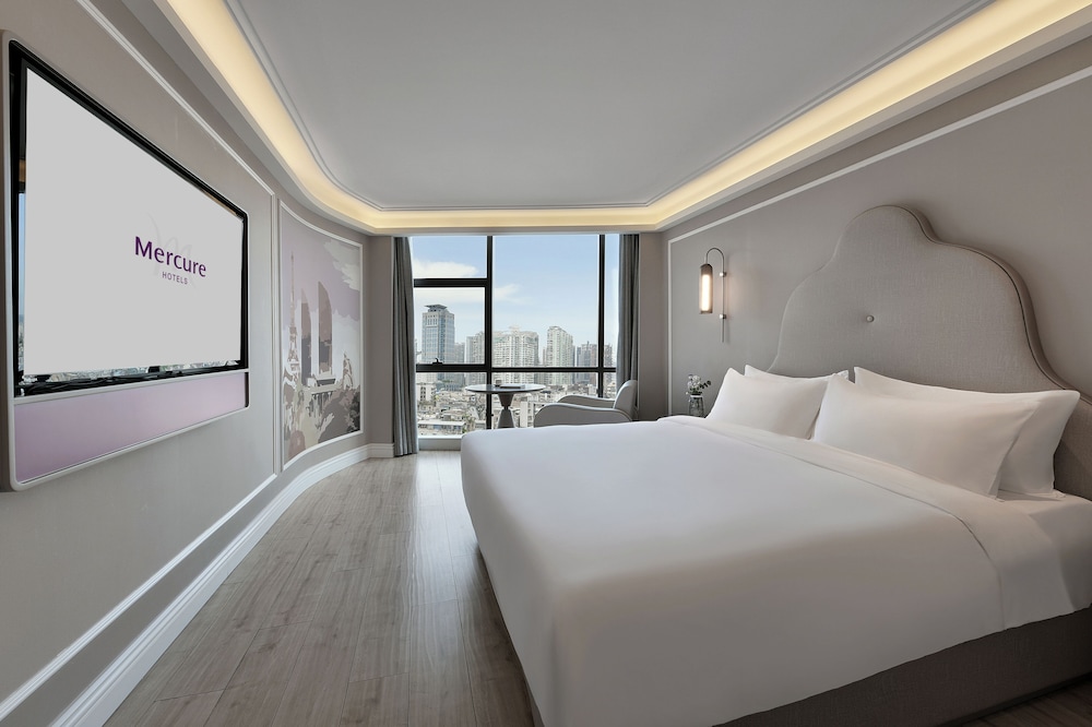 Habitación superior, 1 cama de matrimonio grande del hotel Mercure Xiamen On The Bund. Foto 5
