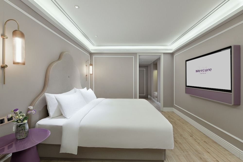 Habitación superior, 1 cama de matrimonio grande del hotel Mercure Xiamen On The Bund. Foto 8