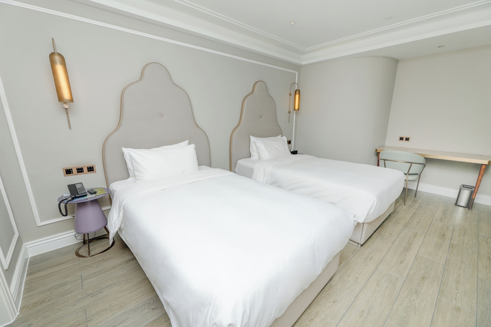 Habitación superior, 2 camas individuales del hotel Mercure Xiamen On The Bund. Foto 8