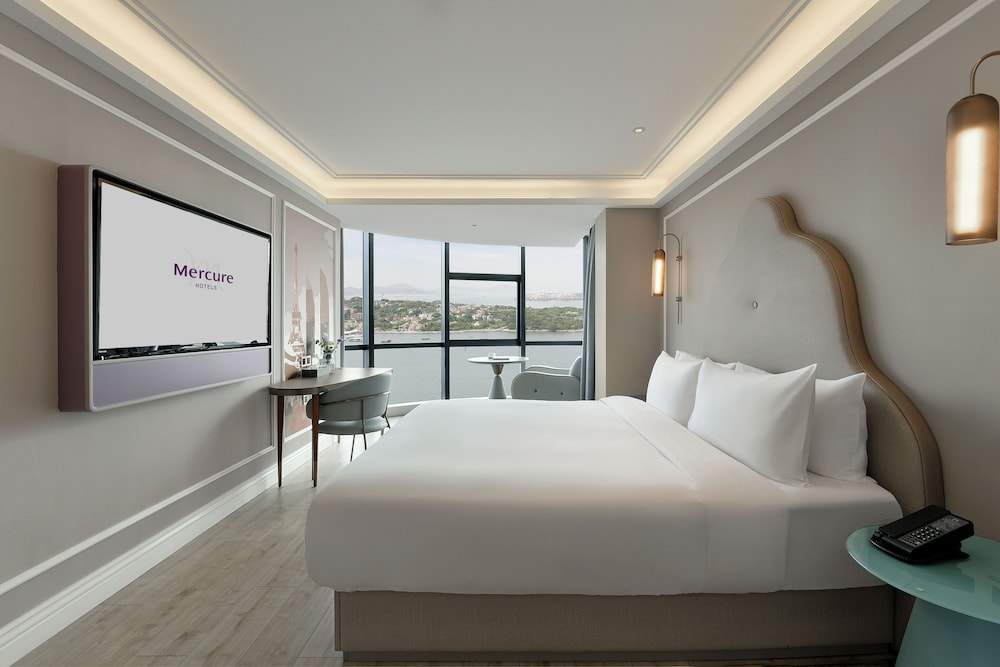 Habitación Deluxe, 1 cama de matrimonio grande (Duplex) del hotel Mercure Xiamen On The Bund. Foto 3