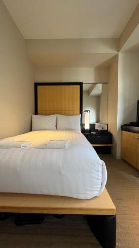 Habitación Doble con 1 cama doble pequeña - No fumadores del hotel KOKO Premier Kanazawa Korinbo. Foto 3