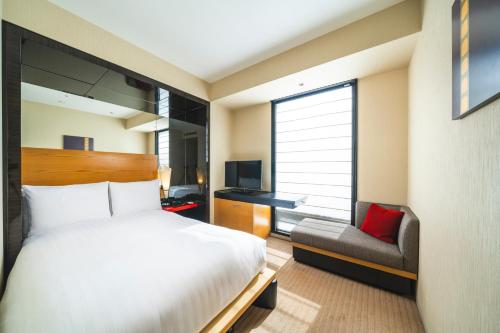 Habitación Doble con 1 cama doble pequeña - No fumadores del hotel KOKO Premier Kanazawa Korinbo. Foto 8