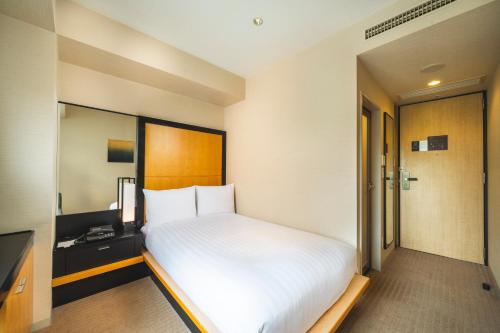 Habitación Doble con 1 cama doble pequeña - No fumadores del hotel KOKO Premier Kanazawa Korinbo. Foto 10