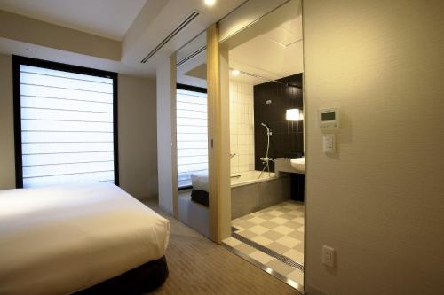 Habitación Deluxe con cama extragrande - Adaptada para personas de movilidad reducida - No fumadores del hotel KOKO Premier Kanazawa Korinbo. Foto 1