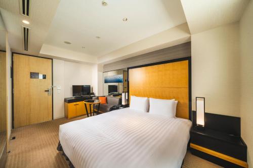 Habitación Deluxe con cama extragrande - Adaptada para personas de movilidad reducida - No fumadores del hotel KOKO Premier Kanazawa Korinbo. Foto 11