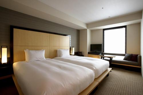 Habitación Doble Económica para no fumadores - 2 camas del hotel KOKO Premier Kanazawa Korinbo