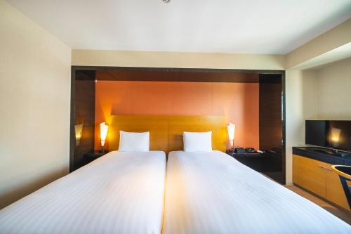 Habitación Doble Económica para no fumadores - 2 camas del hotel KOKO Premier Kanazawa Korinbo. Foto 11