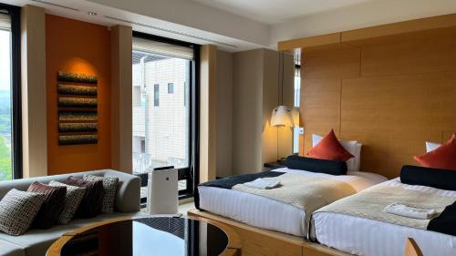 Habitación Doble Deluxe para no fumadores - 2 camas individuales del hotel KOKO Premier Kanazawa Korinbo. Foto 4