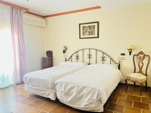 Habitación Triple del hotel El Seto. Foto 1