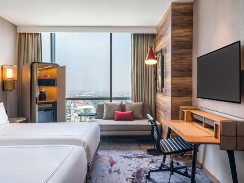 Habitación Swiss Advantage - 2 camas del hotel Swissôtel Jakarta Pik Avenue. Foto 3