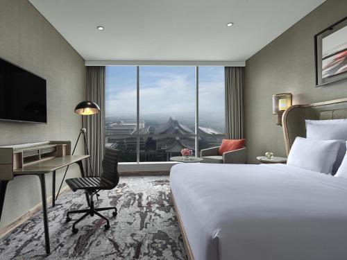 Gran Habitación con cama extragrande del hotel Swissôtel Jakarta Pik Avenue