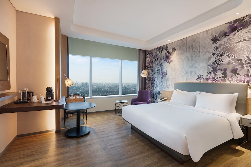 Habitación Privilege con 1 cama doble del hotel Mercure Jakarta Gatot Subroto. Foto 1