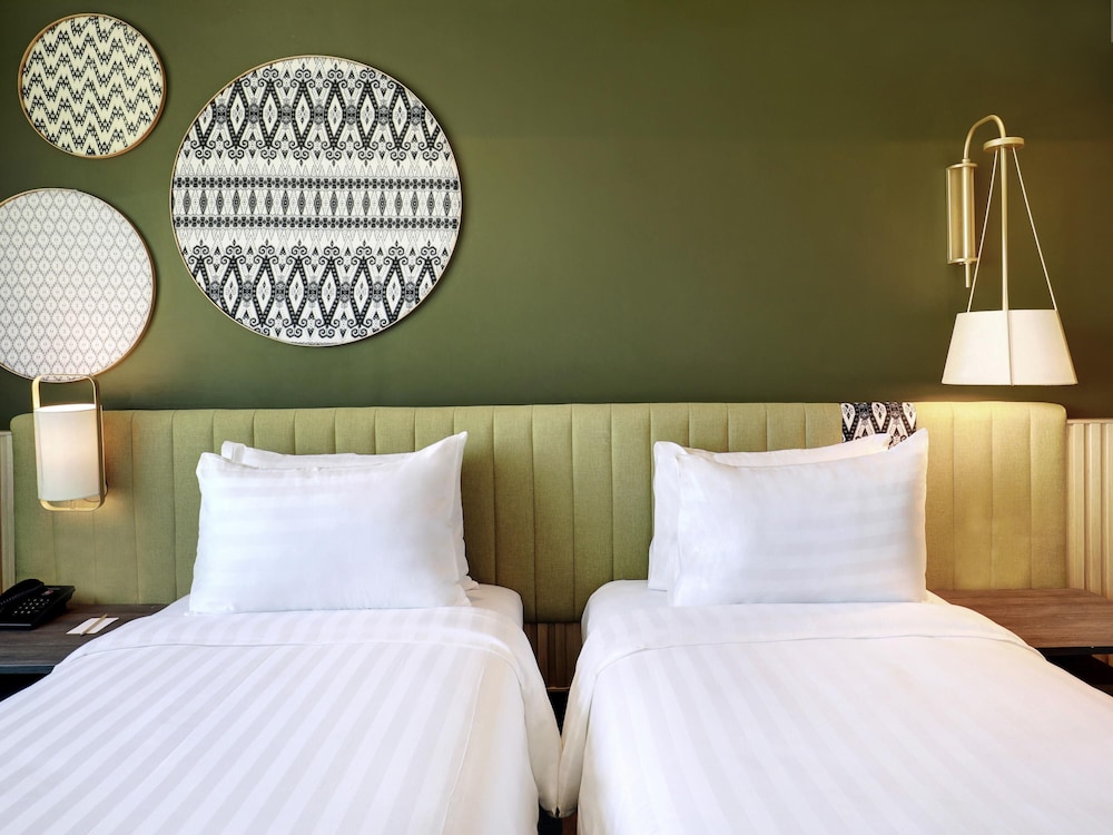 Habitación Luxe con 2 camas individuales del hotel Mercure Makassar Nexa Pettarani. Foto 2