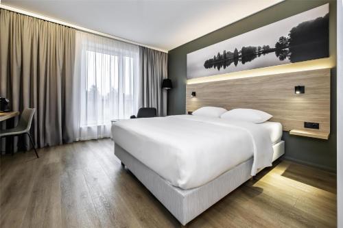 Habitación Superior con vistas parciales al aeropuerto del hotel Park Inn by Radisson Vilnius Airport Hotel & Conference Centre