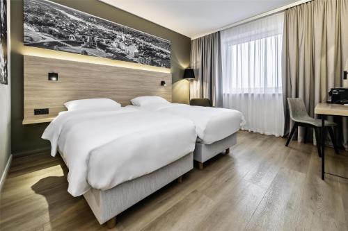 Habitación Doble Superior con terraza con vistas parciales al aeropuerto - 1 o 2 camas del hotel Park Inn by Radisson Vilnius Airport Hotel & Conference Centre. Foto 4
