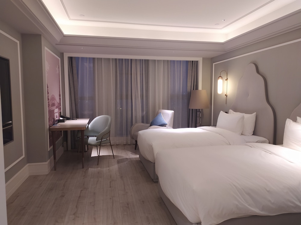 Habitación estándar con 2 camas individuales, 2 camas individuales del hotel Mercure Hangzhou East Railway Station. Foto 2
