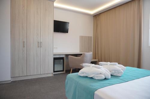 Habitación Triple Estándar del hotel Sol De Jávea. Foto 2