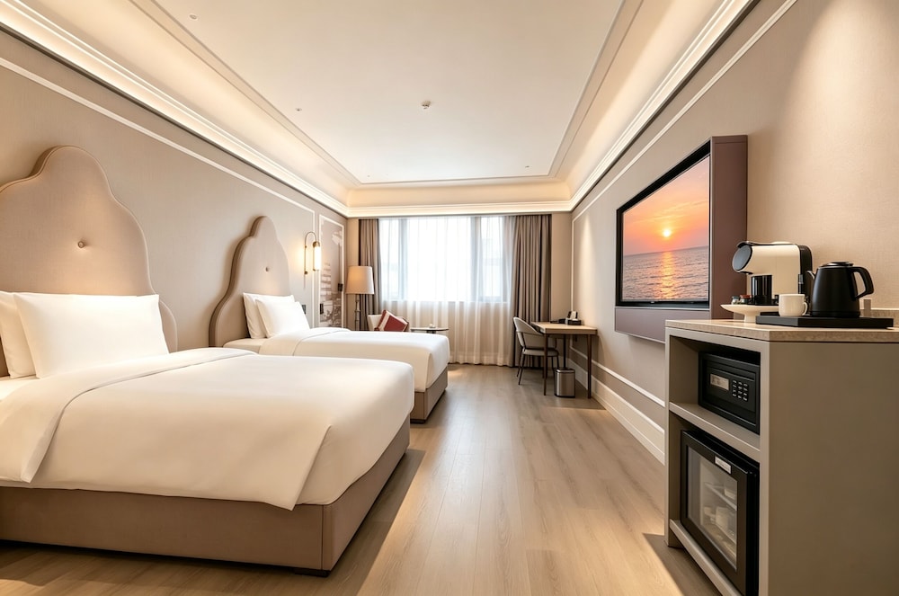 Habitación Privilege con 2 camas individuales del hotel Mercure Xian Dayan Pagoda. Foto 7
