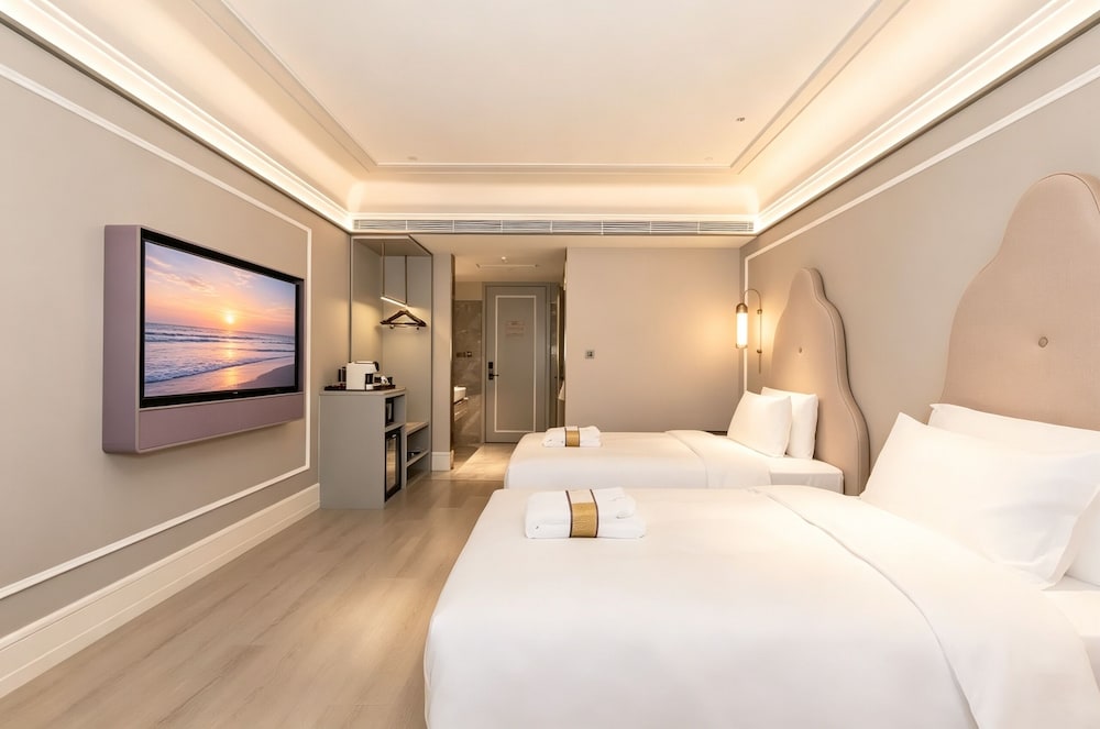 Habitación Privilege con 2 camas individuales del hotel Mercure Xian Dayan Pagoda. Foto 9