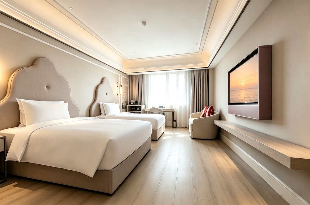 Habitación Familiar Clásica del hotel Mercure Xian Dayan Pagoda. Foto 6