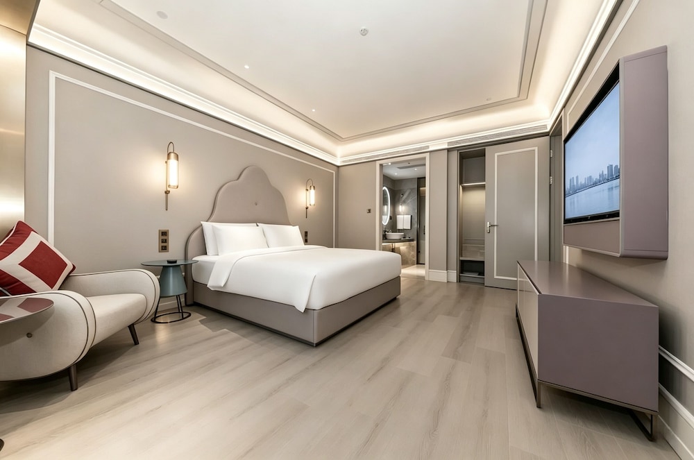 Suite Deluxe con 1 cama King Size del hotel Mercure Xian Dayan Pagoda. Foto 10