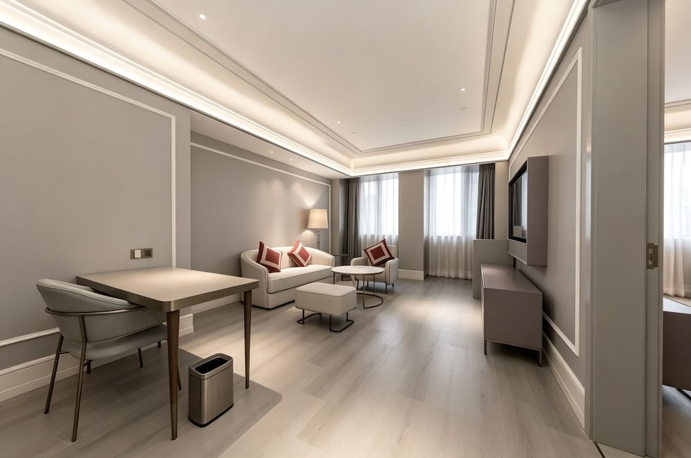 Suite Deluxe con 1 cama King Size del hotel Mercure Xian Dayan Pagoda. Foto 11
