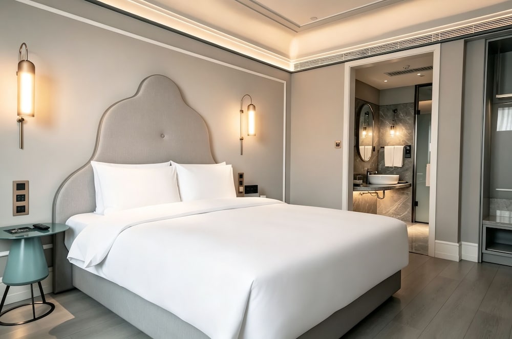 Suite Deluxe con 1 cama King Size del hotel Mercure Xian Dayan Pagoda. Foto 13