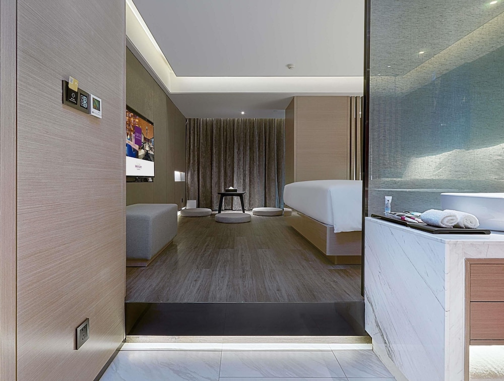 HABITACIÓN SUPERIOR con 1 cama king size del hotel Mercure Yinchuan Xinhua. Foto 5