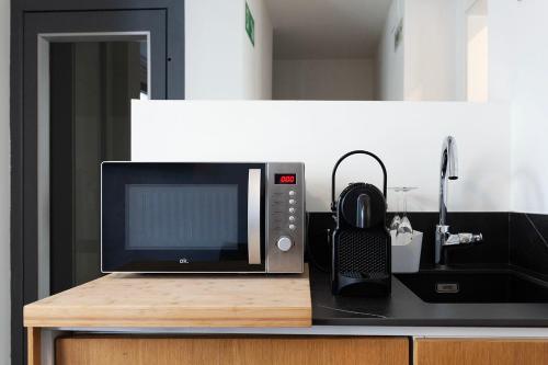 Habitación Doble Dúplex con terraza y piscina del hotel Welldone Cathedral. Foto 22