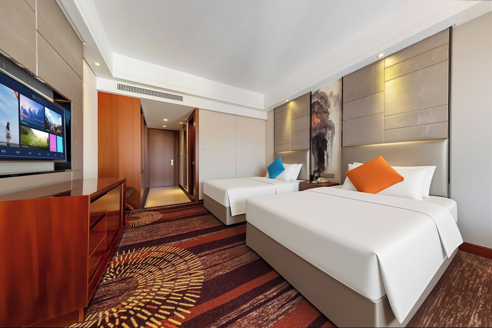 Habitación Premium Doble del hotel Zhangjiajie Huatian. Foto 1