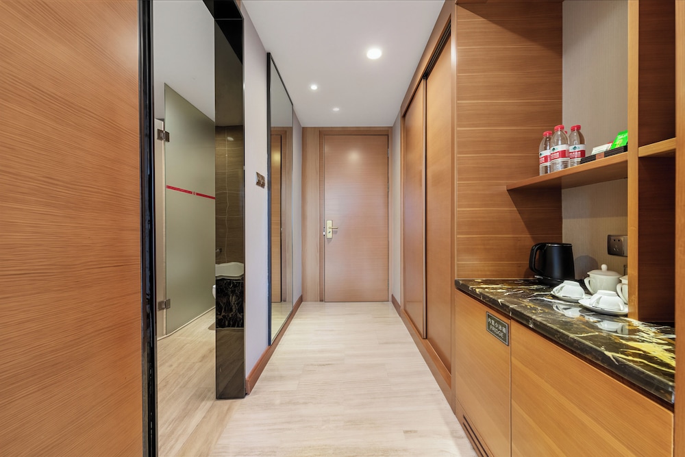 Habitación Individual Premium del hotel Zhangjiajie Huatian. Foto 4