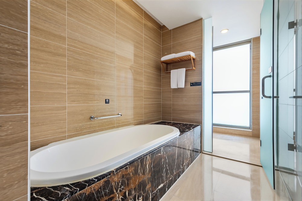 Habitación individual ejecutiva del hotel Zhangjiajie Huatian. Foto 6