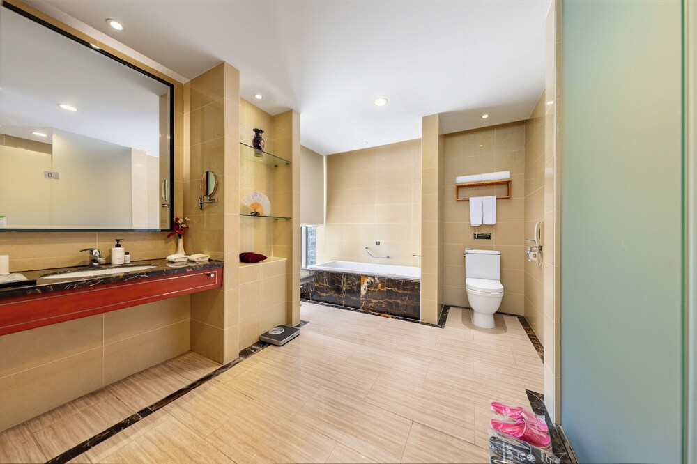 Suite Premium del hotel Zhangjiajie Huatian. Foto 7