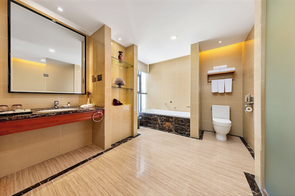 Suite Familiar del hotel Zhangjiajie Huatian. Foto 9