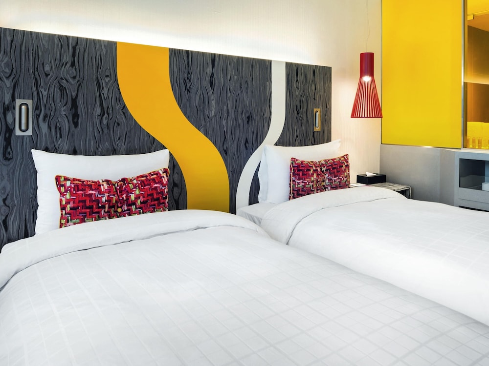 Habitación superior con 2 camas individuales del hotel Ibis Styles Ambassador Seoul Gangnam